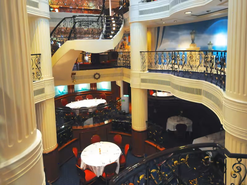 The three level Clipper Dining Room on Royal Clipper, seen from the atrium balconies